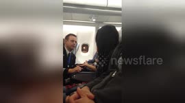 Newsflare Edit - KLM Flight Toronto to Amsterdam, removal of drunk passenger