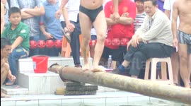 Funny walk single plank bridge in a swimming pool