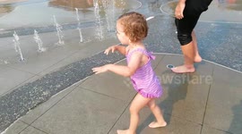 Dad and Daughter at Spray Park in Seattle