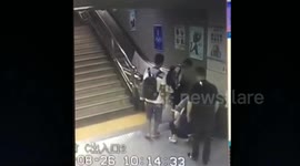 Terrifying moment woman falls through manhole in station
