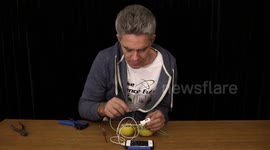 Science teacher shows how to charge a mobile phone using lemons