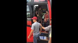 Angry driver tries to kick French tourists off bus in Vietnam
