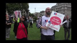 Nurses hold a scraps the carps demonstration, Parliament Square, London, UK