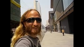 China. Chengdu. Two Chinas same street modern and traditional. 2015