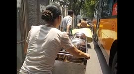 China. Chongqing (5) Traffic and people carrying all kind of things. 2015