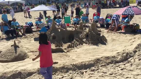 Sandcastle with Mermaid & Dolphin Sand Sculptures for 39th Annual Contest