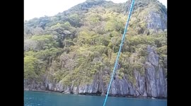 Philippines. Filipinas. Bacuit archipelago. El Nido (1) Boat and exit from the beach. 2015