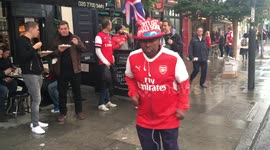 Calm before the storm - Arsenal and Koln fans mingle before police troubles start