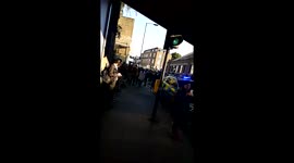 Person seen on the ground outside Parsons Green Station