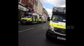 Heavy police presence outside Parsons Green station