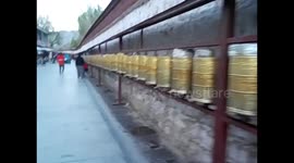 Tibet. Lhasa I. (7) Potala palace spinning wheels. 2015