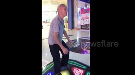 Chinese elderly man is 'addicted' to dance arcade games