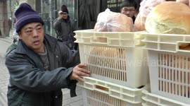 Bread queue in Harbin,China in freezing winter