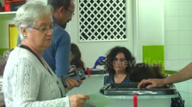 depositing the ballot paper in the ballot box of the Catalonian self-determination referendum