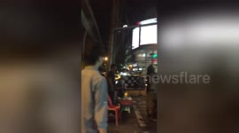 Newsflare Edit - Husband gets an ear-bashing from his wife in red-light district