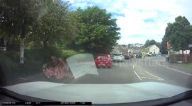 Roundabout incident St Austell. Van vs Car