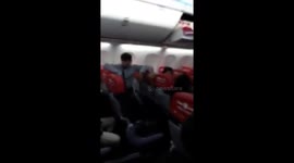 Angry flyer demands passengers 'occupy' plane after it was delayed