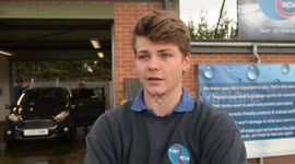 Car valet workers dodged death after being hit by a would-be-robber's car