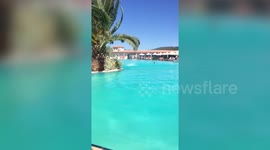 Shocking footage shows tornado in hotel swimming pool