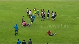 Goalkeeper beaten opponent players during soccer game in Indonesia