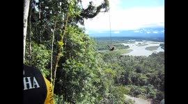 Ecuador. Selva amazónica. Pulling into the abyss with a viane. Rubén lanzándose con liana al abismo. Toma 2. 2014