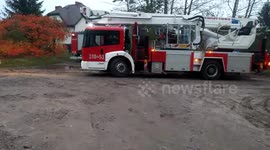 Polish firemen and police intervention in suburban home