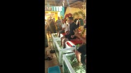Tourist's hilarious reaction to having his first ever fish pedicure