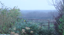 Rain waves on field - Ophelia slowes down