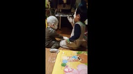 Children cover their faces in nappy rash cream