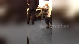 Newsflare Edit - Old British Gentleman in Dubai Int'l Airport security office