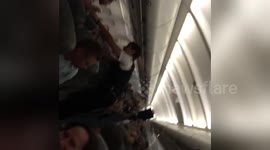 Newsflare Edit - passengers arguing and swearing on Monarch fllght