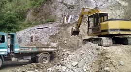 Eight-year-old girl expertly operating backhoe digger on construction site