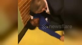 FURTHER FOOTAGE: Assistant principal pins US student to floor