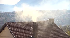 Smoke from neighbors chimney killing us slowly