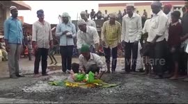 Shocking moment father places baby son on hot coals to fulfil religious vow