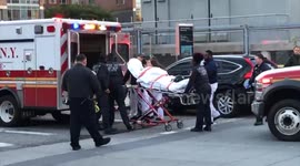 Casualties stretchered into ambulances after New York attack