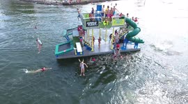 Floating trampoline boat sails about looking for parties