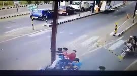 Dodging toll gate, bike riders ram into electricity pole