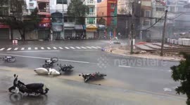 Typhoon Damrey batters a road in Vietnam