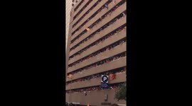 Crowd returns hat during Houston Astros Parade