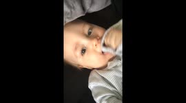 Baby appears to tell dad to f*** off because he is tired