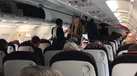 French Olympic coaches sing 'La Marseillaise' on plane