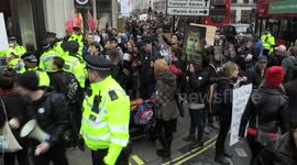 Animal Rights activists demonstrate outside the Canada Goose store on Regent Street London.