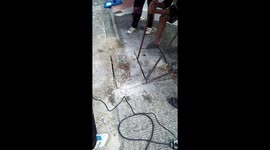 Seven men rescue kittens trapped in concrete sewer