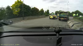 Maintenance workers parked on roundabout nearly cause crash