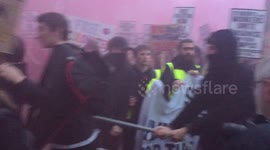 Downing Street bathed in smoke as free education protesters demonstration arrives at Whitehall