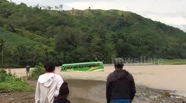 School bus driver takes risky shortcut through flooded river