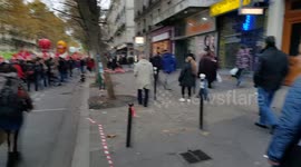 The scene after insurance agency AXA was damaged by protestors throwing asphalt pieces at the glass façade.