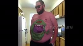 Man dancing with pop culture references painted on his tummy