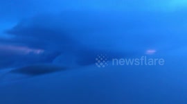 Crazy lightning storm seen from Thai Airways flight